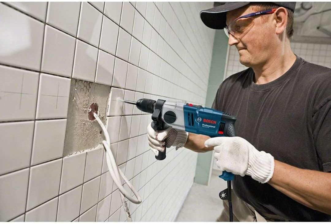 Bosch Professional: wiertarka udarowa GSB 18-2 RE (ogranicznik głębokości 210 mm, rękojeść dodatkowa, zębaty uchwyt wiertarski 13 mm, walizka)
